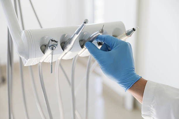 Professional Invisalign Clear Aligners technician working in Oak Park, MI